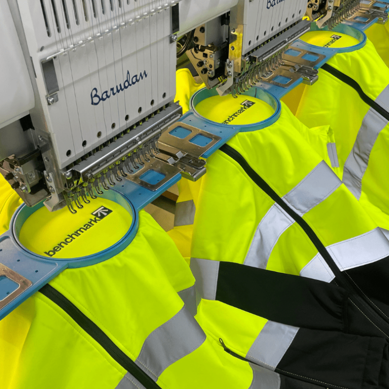 The Complete Guide to Embroidered Workwear for Small Businesses 1 Hi-vis hoodies being embroidered