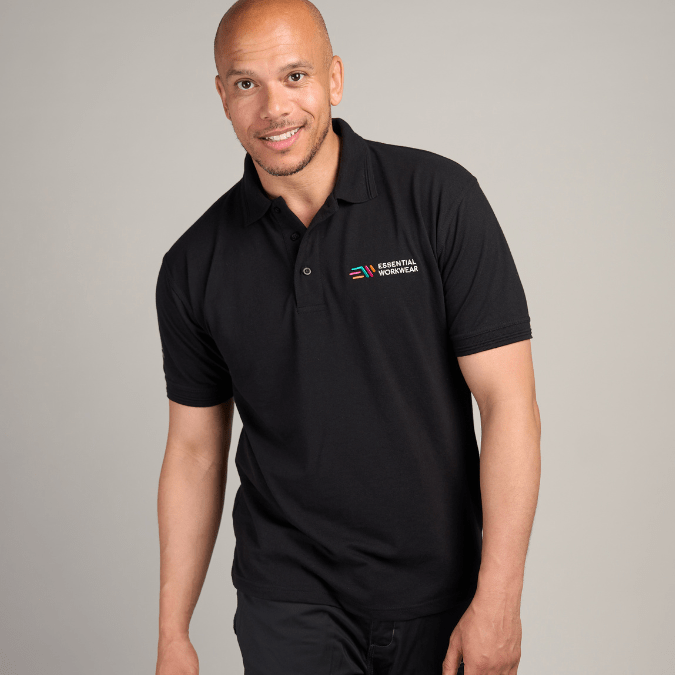 Model wearing black unisex polo shirt