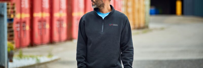 man wearing layered workwear